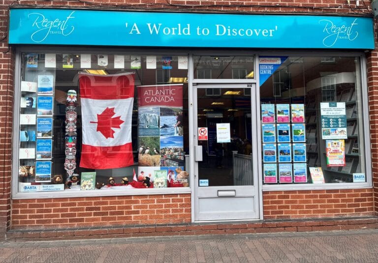 Spear Travel branch window display for holiday enquiries