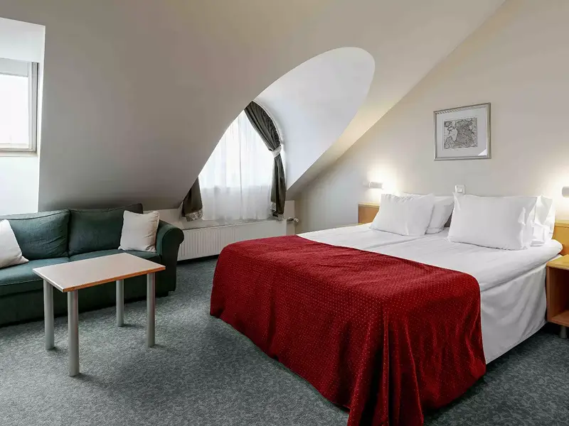 Comfortable guest room at Rixwell Viru Square Hotel