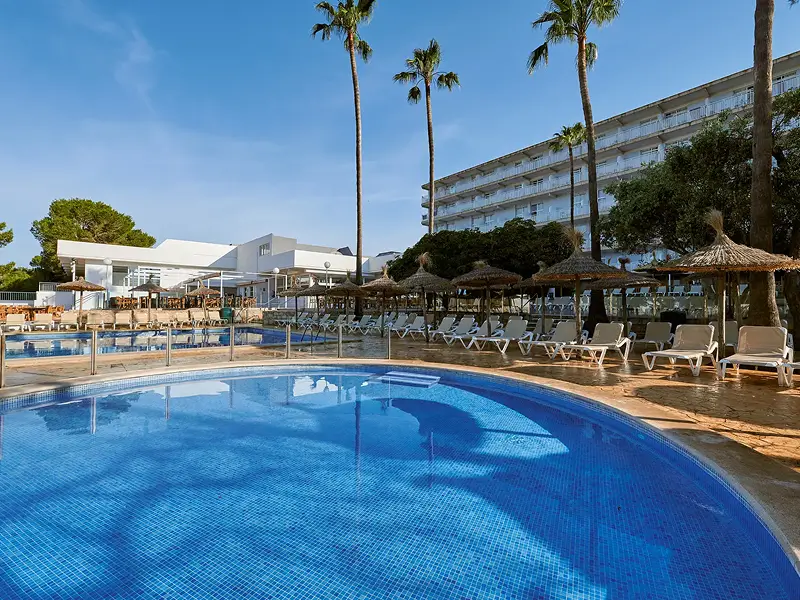 Outdoor swimming pool and sun terrace at AluaSun Cala Antena